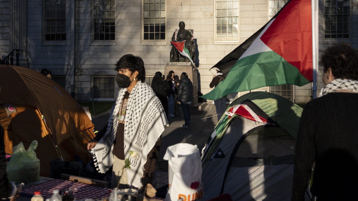 A student protester stands in front of the statue of John Harvard, the first major benefactor of Harvard College, draped in the Palestinian flag, at an encampment of students protesting against the war in Gaza, at Harvard University in Cambridge, Mass. File image/ AP A student protester stands in front of the statue of John Harvard, the first major benefactor of Harvard College, draped in the Palestinian flag, at an encampment of students protesting against the war in Gaza, at Harvard University in Cambridge, Mass. File image/ AP