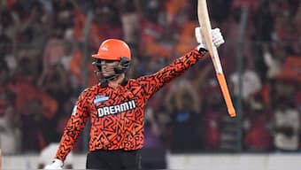 Sunrisers Hyderabad opener Abhishek Sharma celebrates after completing his century in just 40 balls against Punjab Kings in Hyderabad. PTI