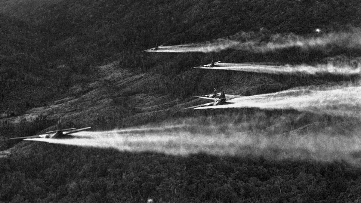Flying a bare 100 feet above the jungle hills west of Hue, 5 bulky 'C-123 providers' cut loose a spray of chemical defoliant on August 14, 1968. File Image/AP Flying a bare 100 feet above the jungle hills west of Hue, 5 bulky 'C-123 providers' cut loose a spray of chemical defoliant on August 14, 1968. File Image/AP