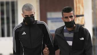 Palestinian Ahmad Manasra, left, who took part in an attack in 2015 when he was 13 and developed schizophrenia in prison, walks upon his release in Jerusalem, April 10, 2025. File Image/AP