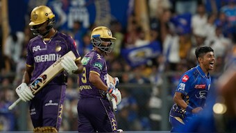 Kolkata Knight Riders captain Ajinkya Rahane (centre) walks back after getting dismissed by Mumbai Indians pacer Ashwani Kumar. AP