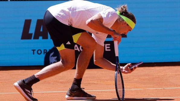 Why did Alexander Zverev take a photo from his phone during his Madrid Open match?