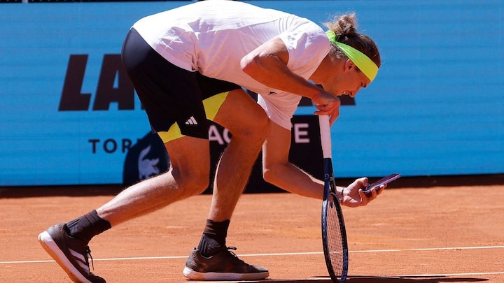 Why did Alexander Zverev take a photo from his phone during his Madrid Open match?
