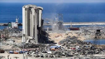 Diggers remove earth at the blast site next to the silos at the port of Beirut on August 16, 2020, in the aftermath of the massive August 4 explosion there that ravaged Lebanon's capital. AFP File