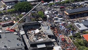 Rescue workers search for survivors at the Jet Set nightclub after its roof collapsed during a merengue concert in Santo Domingo, Dominican Republic, on Tuesday. AP 