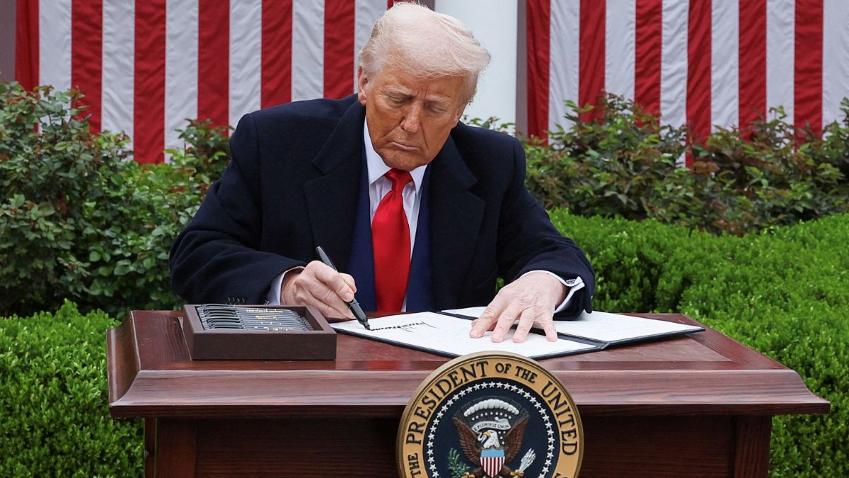 US President Donald Trump signs an executive order. Reuters File US President Donald Trump signs an executive order. Reuters File