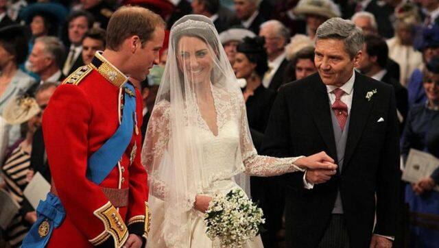 Britain's Prince William stands at the altar with his bride, Kate Middleton, and her father Michael, during their wedding ceremony at Westminster Abbey in central London. File image/Reuters