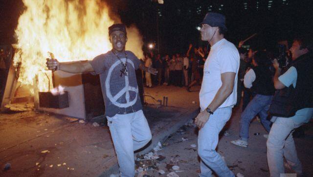 Demonstrators protest the verdict in the Rodney King beating case in front of the Los Angeles Police Department headquarters Wednesday, April 29, 1992 in Los Angeles. File image/AP