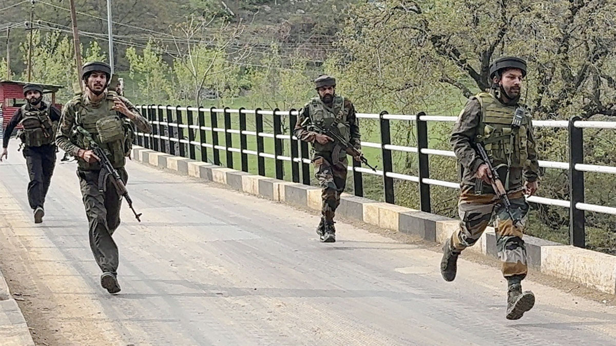 Security personnel rush to the spot after terrorists attacked a group of tourists at Pahalgam, in Anantnag district, Jammu & Kashmir on April 22, 2025. PTI Security personnel rush to the spot after terrorists attacked a group of tourists at Pahalgam, in Anantnag district, Jammu & Kashmir on April 22, 2025. PTI