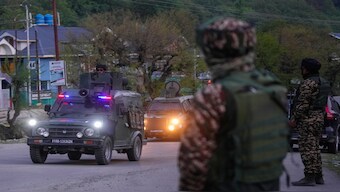 Indian security officers patrol in armored vehicles near Pahalgam in south Kashmir after assailants indiscriminately opened fired at tourists in Pahalgam on Tuesday. AP 
