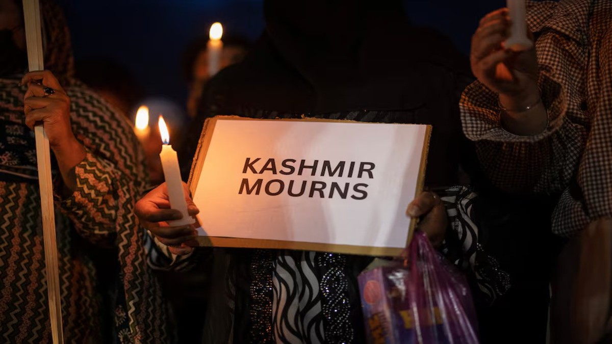 A demonstrator holds a placard with a message and a candle during a candlelight vigil to condemn the Pahalgam terror attack, in Srinagar, on April 23, 2025. REUTERS/Adnan Abidi/File Photo A demonstrator holds a placard with a message and a candle during a candlelight vigil to condemn the Pahalgam terror attack, in Srinagar, on April 23, 2025. REUTERS/Adnan Abidi/File Photo
