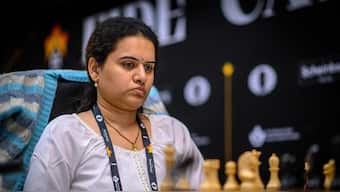 Indian Grandmaster Koneru Humpy finds herself in pole position to win the FIDE Women's Grand Prix in Pune after defeating China's Zhu Jiner in Round 7. PTI