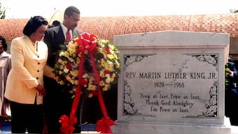 Coretta Scott King, widow of slain civil rights leader Martin Luther King Jr, and son Dexter King (R) lay a wreath at the crypt of King on the 29th anniversary of his death at the King Center in Atlanta, April 4. File Image/Reuters
