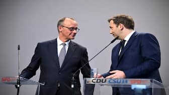German chancellor-in-waiting and CDU leader Friedrich Merz (left) with co-leader of the SPD Lars Klingbeil at a news conference. Image: Annegret Hilse/Reuters 
