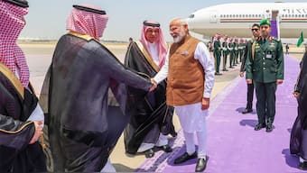 Prime Minister Narendra Modi being received by Saudi Arabia's Minister of Commerce Majid bin Abdullah Al Kassabi and other dignitaries upon his arrival in Jeddah, Saudi Arabia on April 22, 2025. PTI