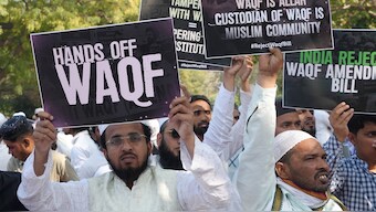 People hold placards during a protest by the All India Muslim Personal Law Board (AIMPLB) against the Waqf (Amendment) Bill at Jantar Mantar, in New Delhi, Monday, March 17, 2025. PTI File