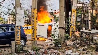 Flames billow out after a vehicle was set on fire during a protest over the Waqf (Amendment) Act, in Murshidabad district of West Bengal. PTI