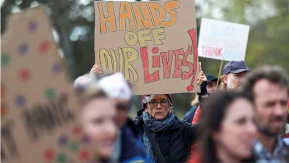 ‘Dogs against DOGE’ and Dylan in the air: Protests erupt in Berlin, Paris and London against Trump-Musk policies