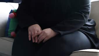 A woman poses at her home in England, UK, January 8, 2025. She was 14 when she was sexually abused by a grooming gang in Rochdale. File Image/Reuters