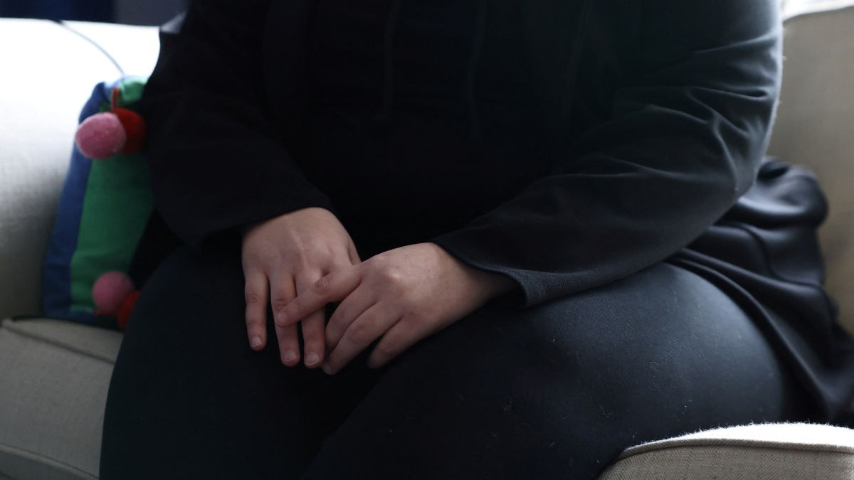 A woman poses at her home in England, UK, January 8, 2025. She was 14 when she was sexually abused by a grooming gang in Rochdale. File Image/Reuters A woman poses at her home in England, UK, January 8, 2025. She was 14 when she was sexually abused by a grooming gang in Rochdale. File Image/Reuters