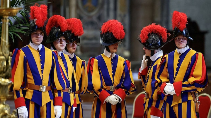 They guard the Pope in life and death: A look at the storied history of the Swiss Guard