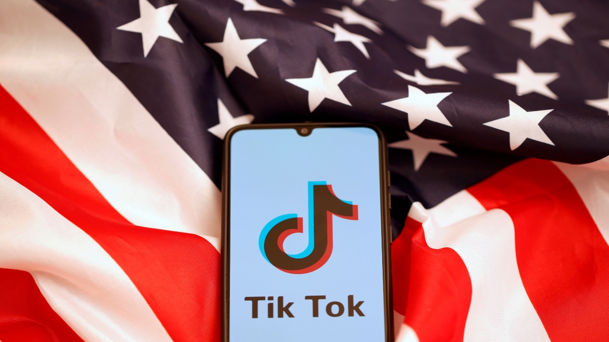Tik Tok logo is displayed on the smartphone while standing on the US flag in this illustration picture taken on November 8, 2019. Reuters File Tik Tok logo is displayed on the smartphone while standing on the US flag in this illustration picture taken on November 8, 2019. Reuters File