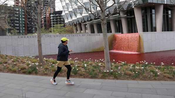 Greenpeace UK head, four other activists pour blood-red dye into US embassy pond, arrested