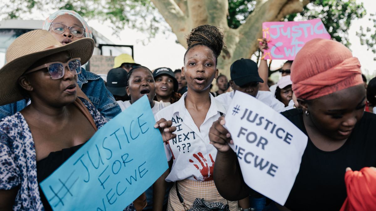 TOPSHOT - Protesters shout slogans and hold placards as they march during a protest against the abuse of young girls and children in Durban on April 1, 2025. AFP TOPSHOT - Protesters shout slogans and hold placards as they march during a protest against the abuse of young girls and children in Durban on April 1, 2025. AFP