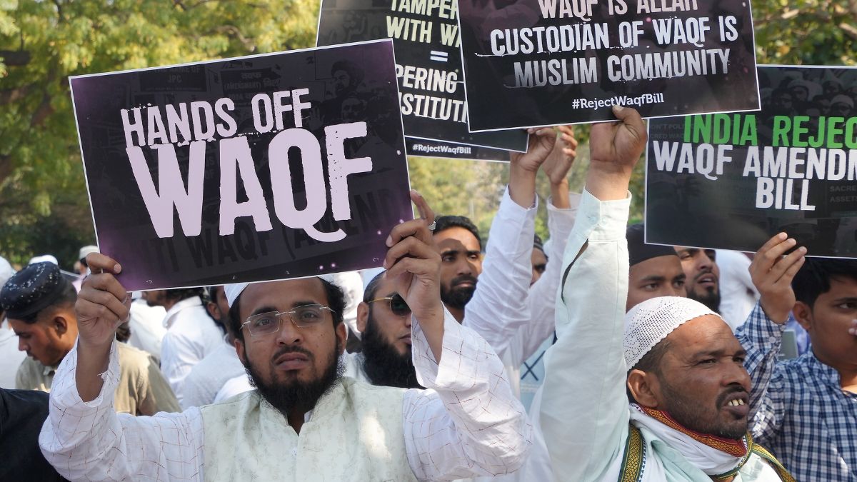 People hold placards during a protest by the All India Muslim Personal Law Board (AIMPLB) against the Waqf (Amendment) Bill at Jantar Mantar, in New Delhi, March 17, 2025. PTI People hold placards during a protest by the All India Muslim Personal Law Board (AIMPLB) against the Waqf (Amendment) Bill at Jantar Mantar, in New Delhi, March 17, 2025. PTI
