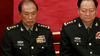 He Weidong (L) and Zhang Youxia, vice chairmen of Chinese Communist Party Central Military Commission (CMC). Reuters
