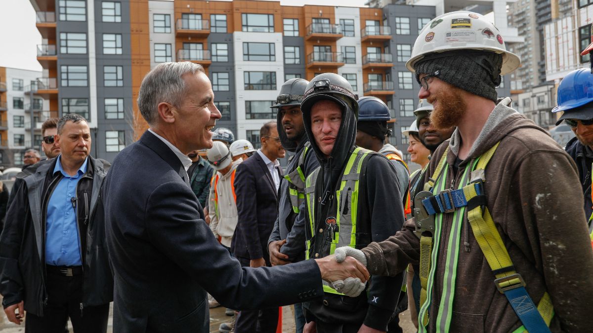 Canada’s Prime Minister Mark Carney shakes hands with a construction worker. Reuters Canada’s Prime Minister Mark Carney shakes hands with a construction worker. Reuters