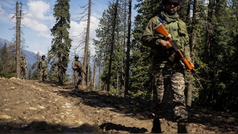 Indian security force personnel patrol at the site of a terrorist attack on tourists in Baisaran near Pahalgam in south Kashmir's Anantnag district, April 24, 2025. Reuters