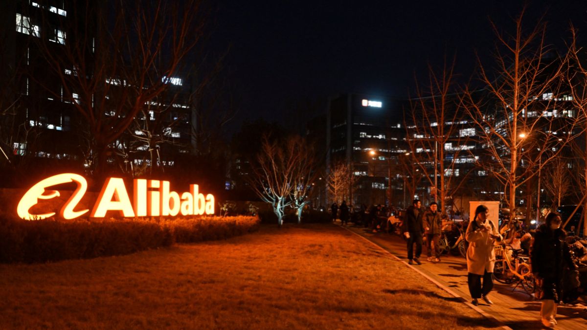 People walk past Alibaba’s offices in Beijing on February 14, 2025. AFP People walk past Alibaba’s offices in Beijing on February 14, 2025. AFP