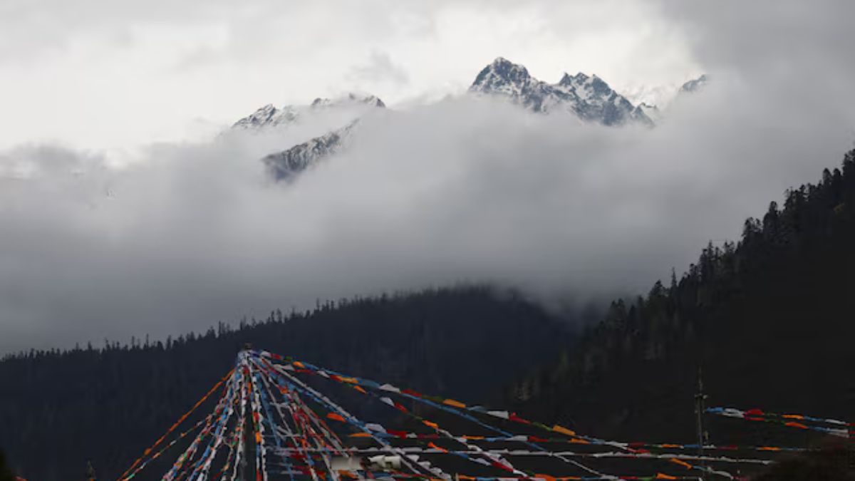 Peak of the Konpo Lhastan mountain and Tibetan prayer flags are pictured at Gaoshang Pasture Scenic Area, during a government-organized tour, in Lulangzhen, Tibet Autonomous Region, China, March 31, 2025. Reuters Peak of the Konpo Lhastan mountain and Tibetan prayer flags are pictured at Gaoshang Pasture Scenic Area, during a government-organized tour, in Lulangzhen, Tibet Autonomous Region, China, March 31, 2025. Reuters