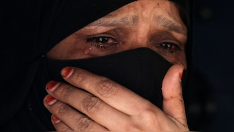 A woman cries before leaving for Pakistan, next to the Attari-Wagah border crossing, after India revoked visas issued to Pakistani citizens, near Amritsar, April 29, 2025. Reuters