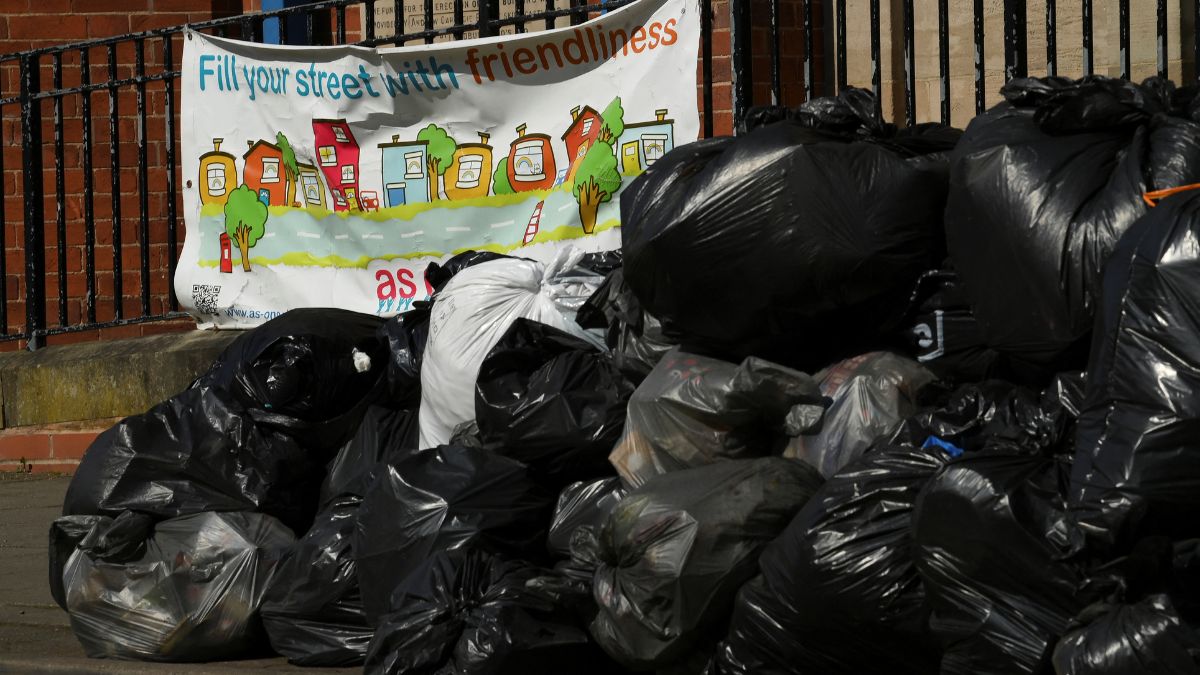 A sign reading "Fill your street with friendliness" is seen next to a large pile of rubbish on the pavement, in Stirchley, Birmingham. Reuters
A sign reading "Fill your street with friendliness" is seen next to a large pile of rubbish on the pavement, in Stirchley, Birmingham. Reuters