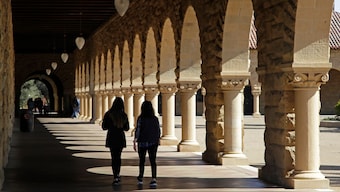 Students walk on the Stanford University campus, in Santa Clara. AP/File Photo
