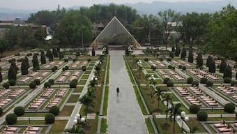 A tourist walks through the Dien Bien Phu Military Cemetery in Dien Bien Phu, Vietnam. AP/File Photo
