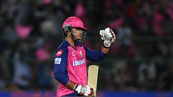 Rajasthan Royals' Vaibhav Suryavanshi celebrates after completing his half-century in 17 deliveries during the Indian Premier League match against Gujarat Titans in Jaipur. Reuters
