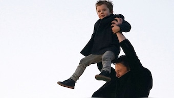 Elon Musk and his son as he disembarks Air Force One at Palm Beach International Airport, West Palm Beach, Florida, on, April 11. The billionaire has fathered 14 children with four women and he wants to increase his brood. Reuters