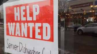 A “Help Wanted” sign hangs in restaurant window in Medford, Massachusetts, U.S., January 25, 2023 Source: Reuters