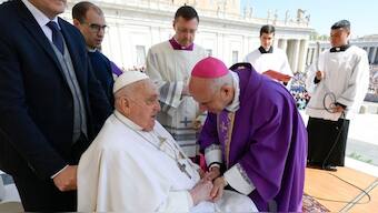 This photo taken and handout on April 4, 2025 by The Vatican Media shows Italian Archbishop Rino Fisichella (R) greeting Pope Francis during a surprise appearance at the end of a mass for the sick and healthcare workers as part of the Jubilee Year in The Vatican. Pope Francis, who is recovering after a serious case of pneumonia, made a surprise appearance Sunday as he mingled with crowds at the Vatican just two weeks after leaving hospital. "A good Sunday to all. Thank you very much", the 88-year old Pope said as he was wheeled through Saint Peter's Square in his wheelchair after a mass dedicated to the sick. Source: AFP