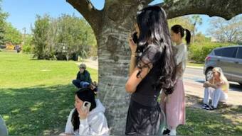 Florida State University students wait for news amid an active shooter incident at the school’s campus in Tallahassee.  Source: AP