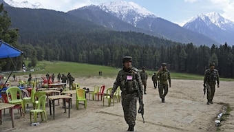 Security personnel inspect the aftermath of the attack in Pahalgam, about 90 kilometres from Srinagar. Source: AFP