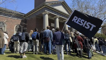 Students and faculty members of Harvard University at a community rally in Cambridge, Massachusetts on April 17. The US administration is cracking down on Harvard after it has refused to follow some of the new government policies. AP  