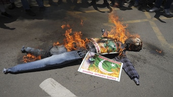 Supporters of Akhil Bharatiya Vidhyarthi Parishad burn an effigy of terrorism during a protest against the killing of tourists by terrorists near Pahalgam in Kashmir, in Ahmedabad, India. AP