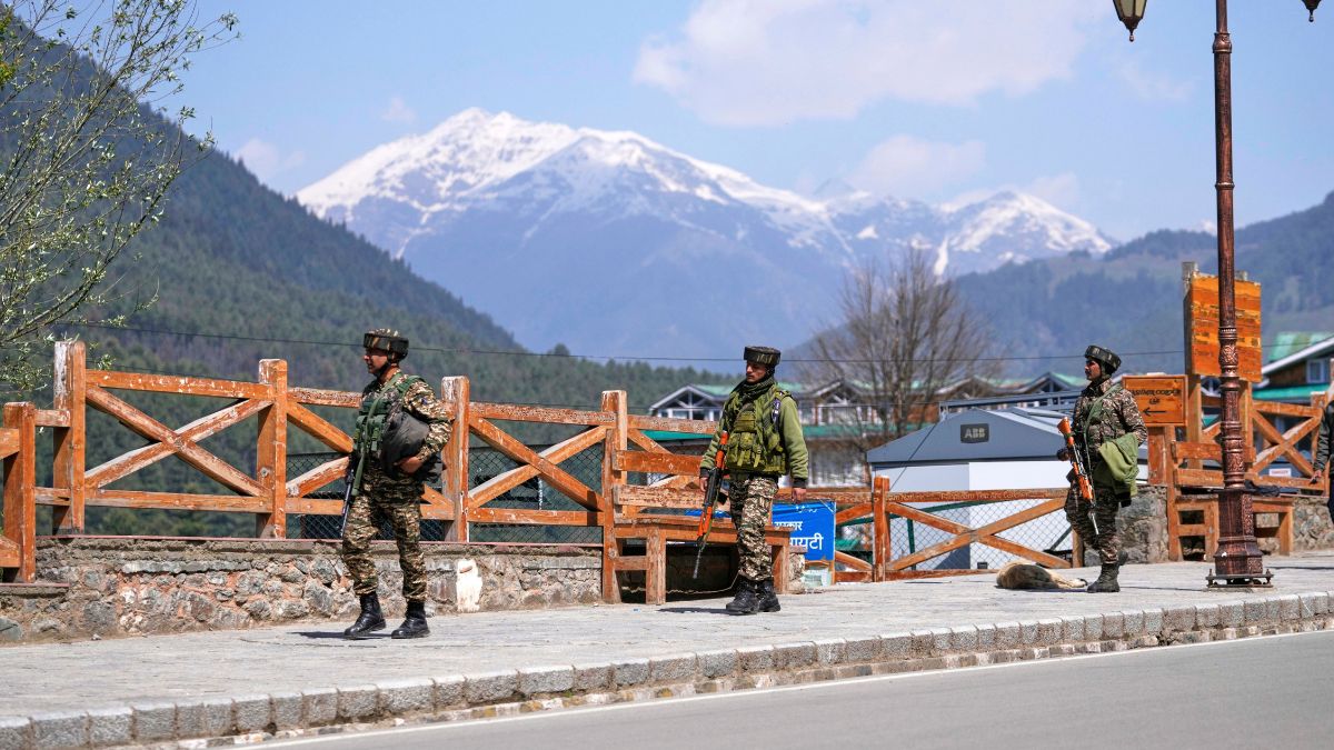 Security personnel patrol a street the morning after militants indiscriminately opened fire on tourists near Pahalgam in Kashmir, Wednesday, April 23, 2025. AP Security personnel patrol a street the morning after militants indiscriminately opened fire on tourists near Pahalgam in Kashmir, Wednesday, April 23, 2025. AP
