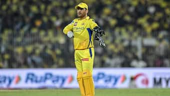 CSK captain MS Dhoni adjusts the field during their match against KKR in IPL 2025. Image: AFP