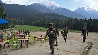 Security personnel inspecting the site in the aftermath of Pahalgam terror attack. AFP
