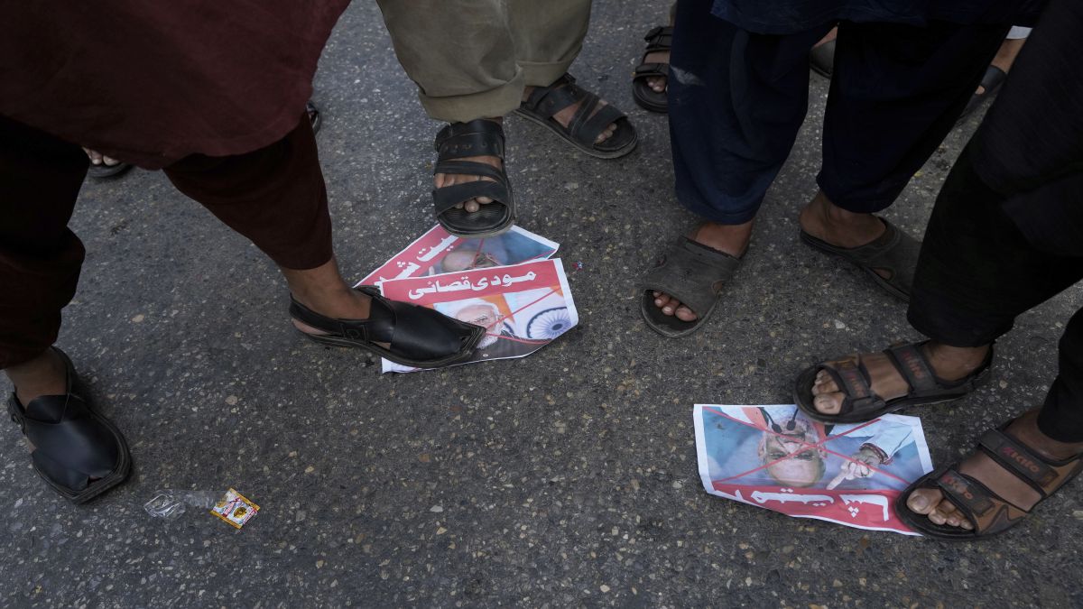 Supporters of the Pakistan Murkazi Muslim League party stand over the crossed posters of Indian Prime Minister Narendra Modi and Indian Home Minister Amir Shah during a demonstration against the suspension of water-sharing treaty by India with Pakistan, in Karachi. AP Supporters of the Pakistan Murkazi Muslim League party stand over the crossed posters of Indian Prime Minister Narendra Modi and Indian Home Minister Amir Shah during a demonstration against the suspension of water-sharing treaty by India with Pakistan, in Karachi. AP